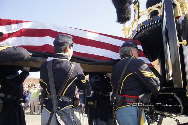 Pallbearers Sgt Bair, Cpl Kane, Sgt Shetley place coffin in hearse